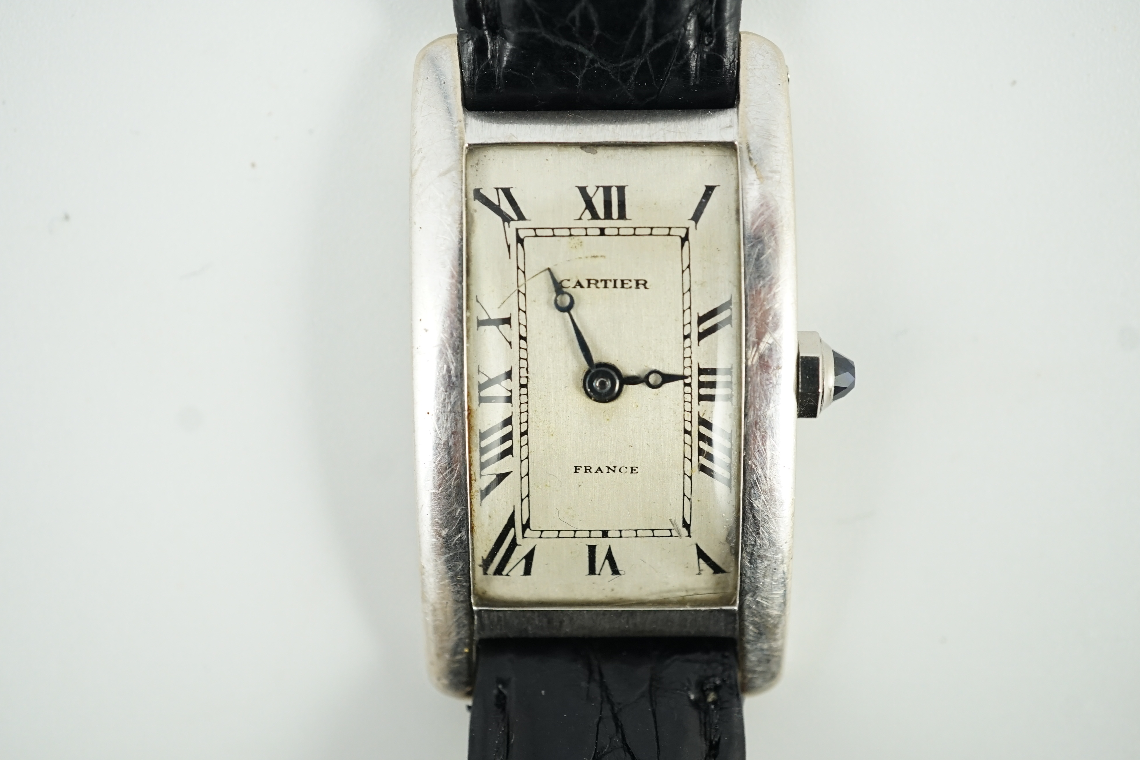 A 1920's 18ct white gold Cartier Tank Cintree (7 lignes model) manual wind wrist watch